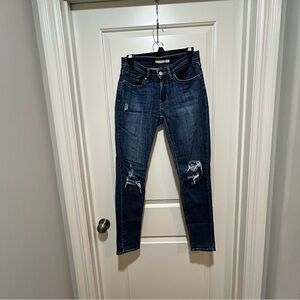 Levi’s women’s size 27, Skinny 711 style. Classic Blue Distressed. Nice pair!